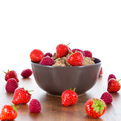 Bran flakes with fresh raspberries and strawberries