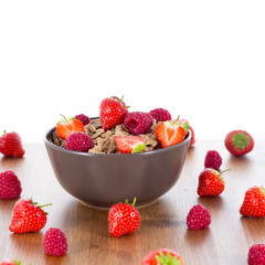 Bran flakes with fresh raspberries and strawberries