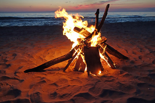 Blazing campfire by Lake Michigan