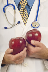 Doctor With Two Apples