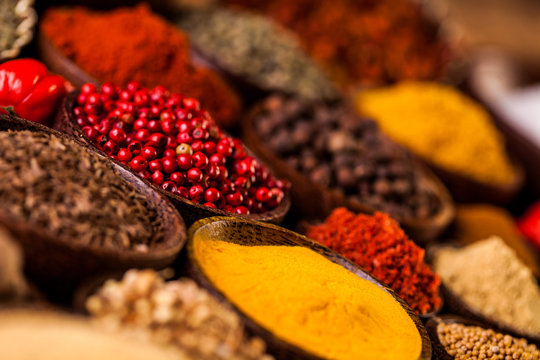 Spices in traditional Asian theme on wooden table