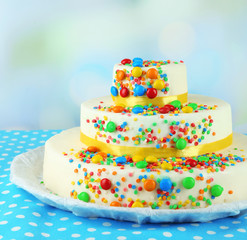 Fototapeta na wymiar Beautiful tasty birthday cake on light background