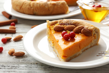 Homemade pumpkin pie on table