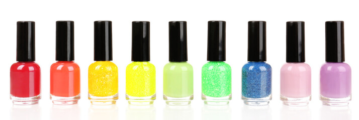 Colorful nail polishes, isolated on white