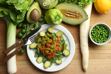 Healthy salad with peas and asparagus served