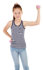 Naklejka premium Beautiful little girl doing exercises isolated on white