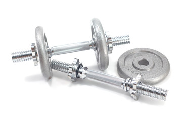 Two Dumbbells and plate isolated on white background
