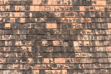 Old roof tiles made of terracotta