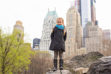 Adorable little girl in Central Park at New York City