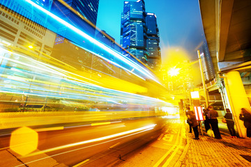 Obraz premium traffic light trails of modern business city