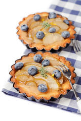 Homemade pear and blueberry tarts