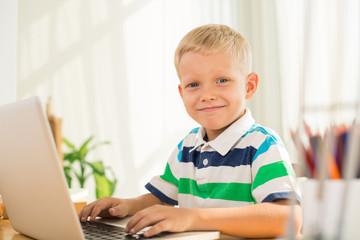 Schoolboy with laptop