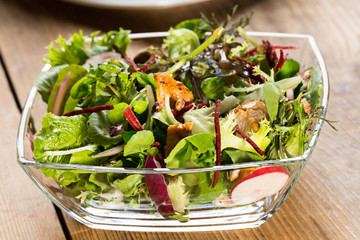 Glass bowl of salad