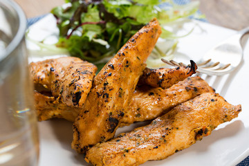 Grilled chicken strips with side salad
