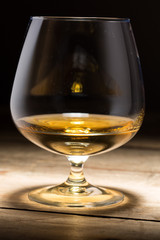 Alcoholic drink in glass with ice