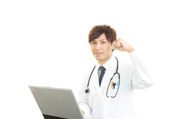 Fototapeta premium ガッツポーズの医師