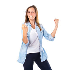 Obraz premium Lucky girl over isolated white background