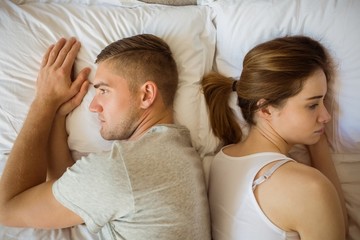 Upset couple not talking to each other after fight