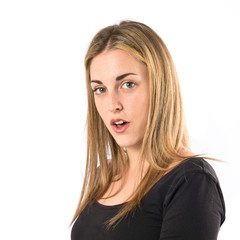 Naklejka premium Girl doing surprise gesture over white background
