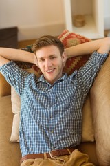 Young man relaxing on his couch