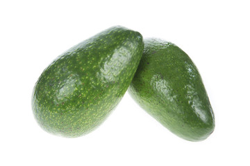 two fresh avocado isolated on white
