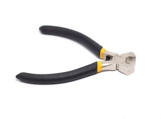 Obraz premium small nippers with black handles on a white background