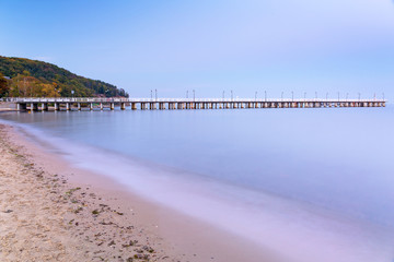 Fototapeta premium Baltic pier in Gdynia Orlowo at dusk, Poland