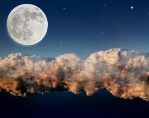 Obraz na płótnie Canvas large moon above dark night clouds