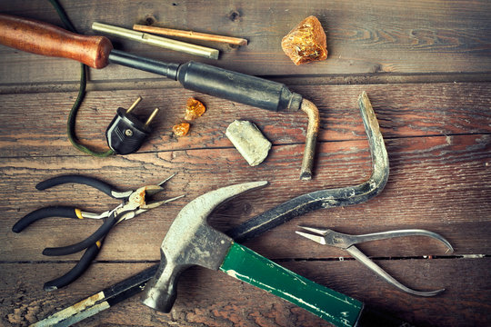Set of old hand tools on old wooden table