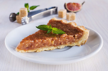 Piece of homemade tart with caramel filling