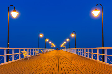 Fototapeta premium Wooden pier at Baltic sea in Gdynia Orlowo, Poland