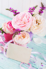 Postcard with elegant  flowers and empty tag for your text