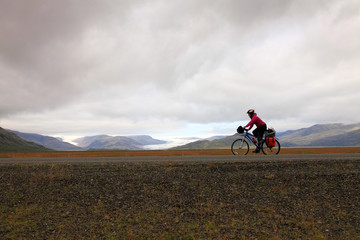 Mountain biker traveling in the mountains