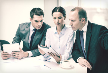 business team with tablet pc having discussion