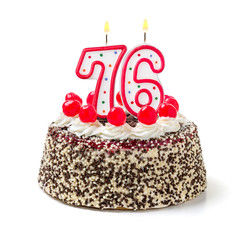Geburtstagstorte mit brennender Kerze Nummer 76