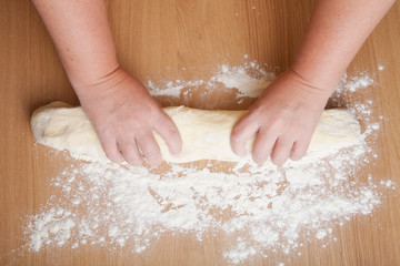 Work the dough on a floured table