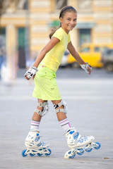 Girl on the roller blades.