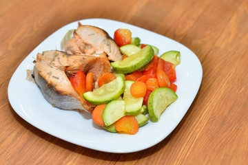 Рыба с  запеченными овощами