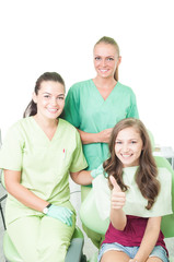 Obraz premium Happy female patient at dentist.