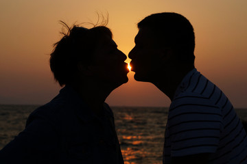 Sweet kiss at sunset