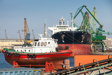 Red pilot boat stands on pier in Varna port, Bulgaria