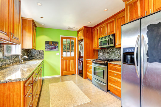 Kitchen room with bright green wall