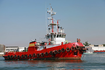 Red tug is underway on Black sea, Bulgaria