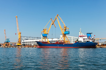 Industrial cargo ship is loading in Burgas port