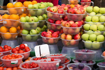 selection of fruit and vegetables at a market.
