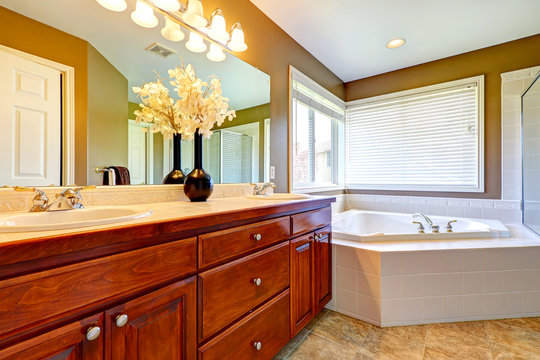 Luxury bathroom interior with corner bath tub