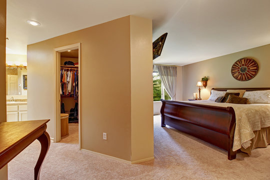 Spacious bedroom interior with walk in closet