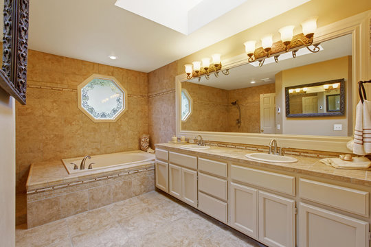 Luxury bathroom interior with tile trim