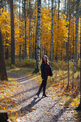 Fototapeta premium Woman enjoying autumn