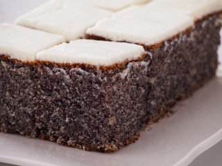 Poppy seed cake with cream frosting